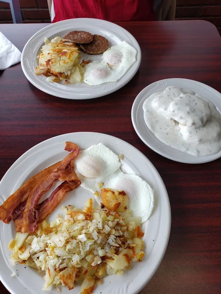 One Egg Breakfast Came with 2 Eggs 3 Strips of Bacon Fried Potatoes 2 Pancakes